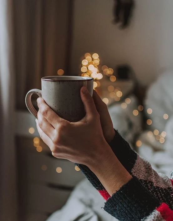 drinking tea in a mug